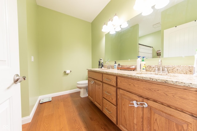8090 N State Highway 7, Elizabethtown, IN 47232 - full bathroom featuring double vanity and wood finished floors
