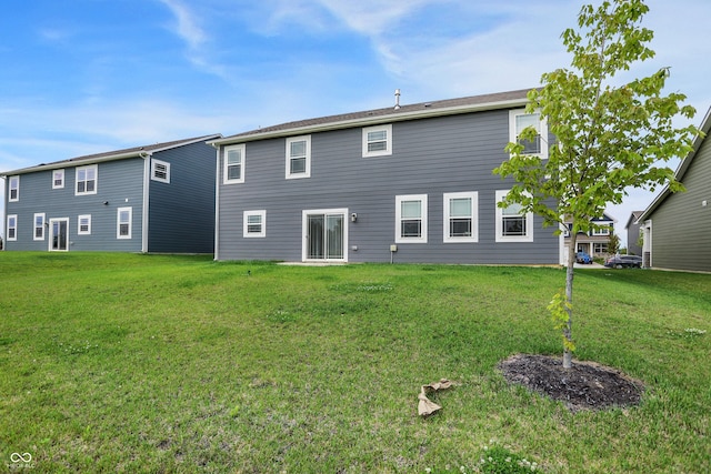 5812 Flat Hill Dr, Indianapolis, IN 46239 - back of house with a lawn