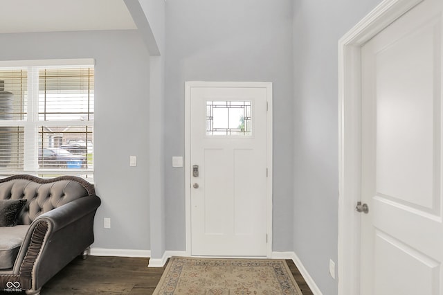 5812 Flat Hill Dr, Indianapolis, IN 46239 - entryway featuring arched walkways and dark wood-style flooring