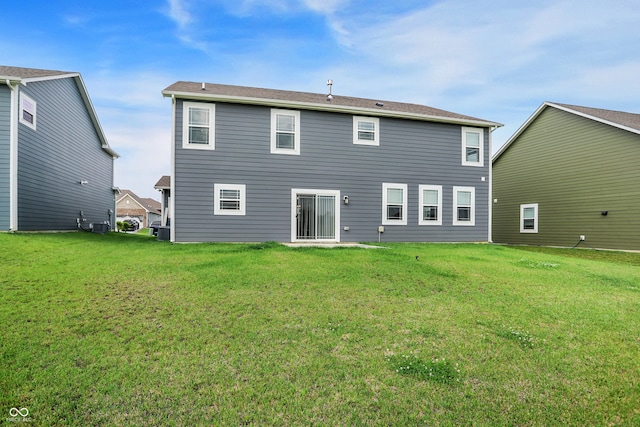 5812 Flat Hill Dr, Indianapolis, IN 46239 - back of property featuring a lawn