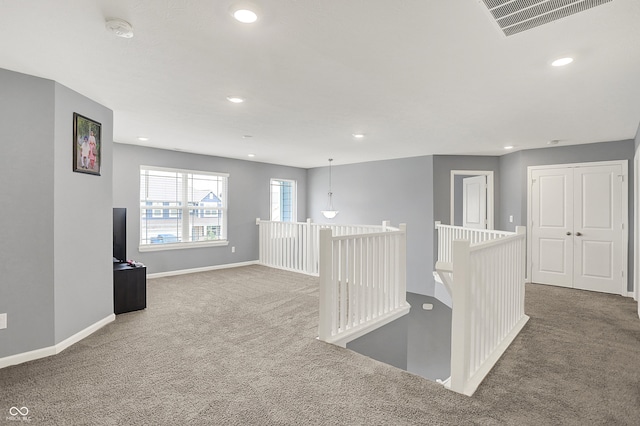 5812 Flat Hill Dr, Indianapolis, IN 46239 - corridor with carpet flooring, an upstairs landing, and recessed lighting