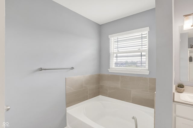 5812 Flat Hill Dr, Indianapolis, IN 46239 - bathroom with vanity and a garden tub