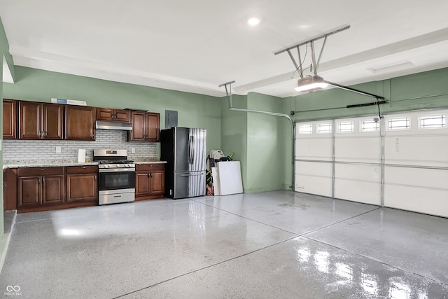 5812 Flat Hill Dr, Indianapolis, IN 46239 - garage with freestanding refrigerator and a garage door opener