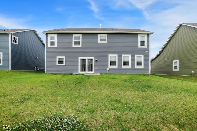 5812 Flat Hill Dr, Indianapolis, IN 46239 - rear view of house featuring a lawn