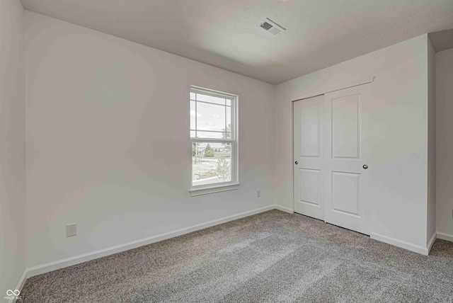 7501 Firecrest Ln, Camby, IN 46113 - unfurnished bedroom featuring carpet flooring and a closet