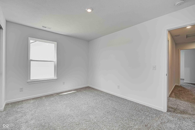 7501 Firecrest Ln, Camby, IN 46113 - carpeted spare room with baseboards and a smoke detector