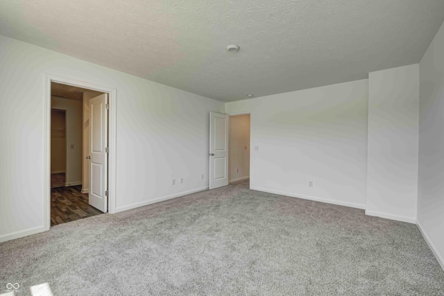 7501 Firecrest Ln, Camby, IN 46113 - carpeted empty room featuring baseboards and a textured ceiling