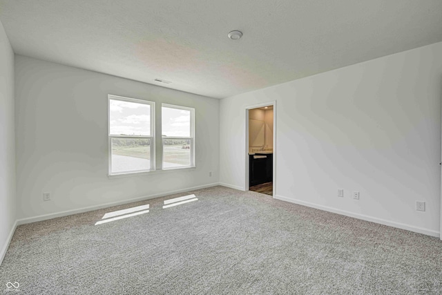 7501 Firecrest Ln, Camby, IN 46113 - carpeted empty room featuring baseboards and a textured ceiling