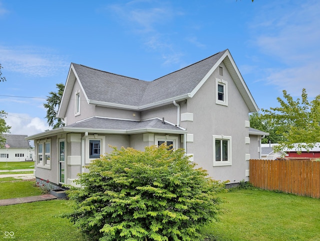 308 W Jefferson St, Kirklin, IN 46050 - view of side of home featuring stucco siding and roof with shingles