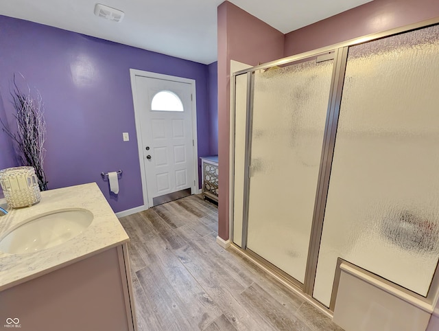 308 W Jefferson St, Kirklin, IN 46050 - full bath with a shower stall, wood finished floors, and vanity