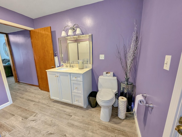 308 W Jefferson St, Kirklin, IN 46050 - bathroom featuring wood finished floors and vanity