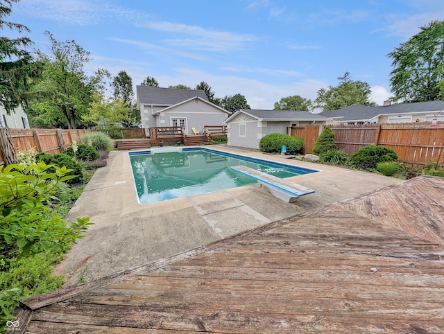 308 W Jefferson St, Kirklin, IN 46050 - view of pool featuring a wooden deck, a fenced backyard, and a diving board