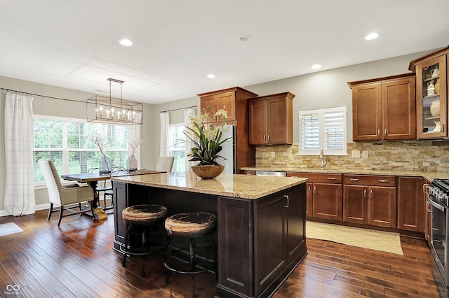 15410 Mission Hills Dr, Carmel, IN 46033 - kitchen with dark wood-type flooring, light stone counters, plenty of natural light, and recessed lighting