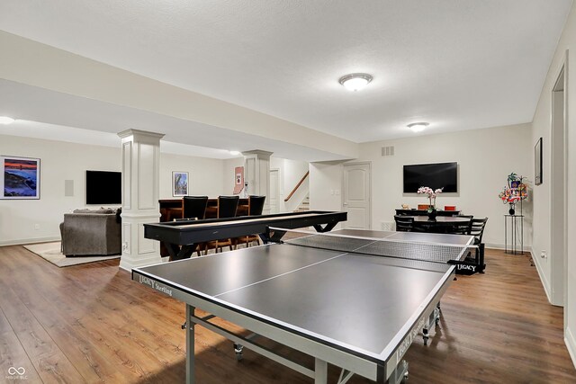 15410 Mission Hills Dr, Carmel, IN 46033 - rec room featuring wood finished floors and ornate columns