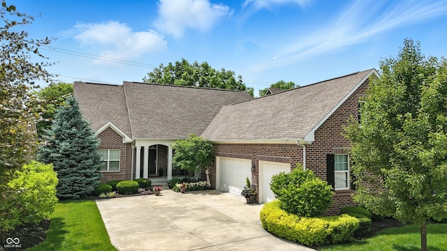 15410 Mission Hills Dr, Carmel, IN 46033 - view of front of home featuring brick siding, a shingled roof, an attached garage, and driveway