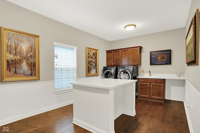 15410 Mission Hills Dr, Carmel, IN 46033 - washroom featuring cabinet space, separate washer and dryer, dark wood-style floors, and wainscoting