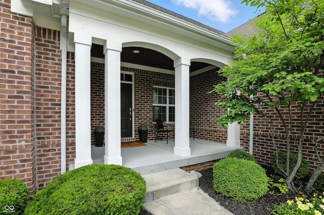 15410 Mission Hills Dr, Carmel, IN 46033 - property entrance featuring brick siding and covered porch