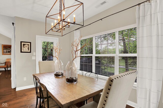 15410 Mission Hills Dr, Carmel, IN 46033 - dining space featuring wood finished floors and a chandelier