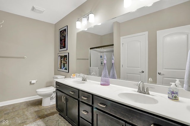 15410 Mission Hills Dr, Carmel, IN 46033 - bathroom featuring double vanity, stone finish floors, and a shower