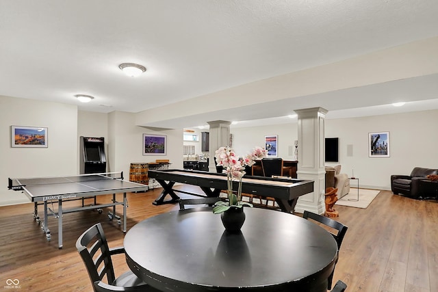 15410 Mission Hills Dr, Carmel, IN 46033 - rec room featuring decorative columns and light wood-type flooring