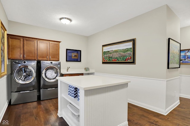 15410 Mission Hills Dr, Carmel, IN 46033 - laundry area featuring separate washer and dryer, dark wood finished floors, and cabinet space