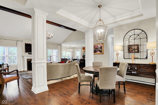 15410 Mission Hills Dr, Carmel, IN 46033 - dining area with decorative columns, a chandelier, dark wood-style flooring, plenty of natural light, and lofted ceiling