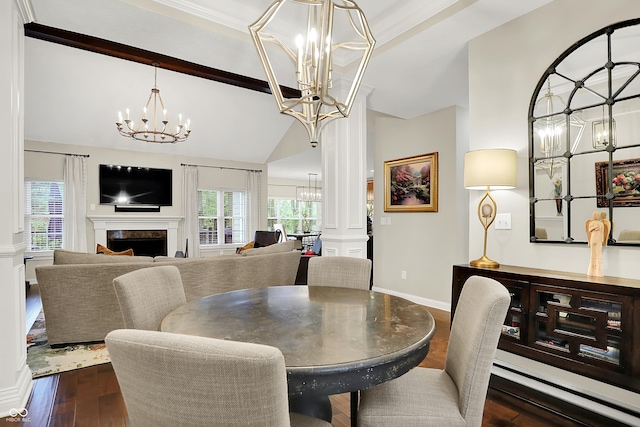 15410 Mission Hills Dr, Carmel, IN 46033 - dining room featuring a chandelier, lofted ceiling, wood finished floors, a fireplace, and decorative columns