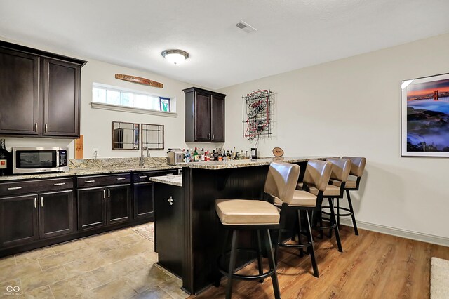 15410 Mission Hills Dr, Carmel, IN 46033 - indoor dry bar featuring stainless steel microwave