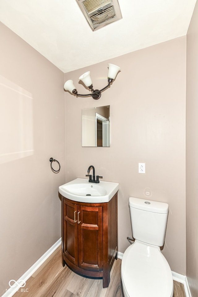 823 Rustic Rd, Anderson, IN 46013 - bathroom featuring vanity and wood finished floors