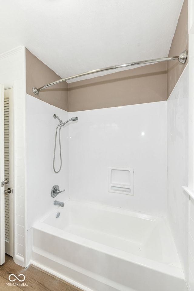 823 Rustic Rd, Anderson, IN 46013 - bathroom with shower / bath combination and wood finished floors