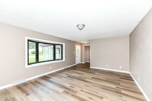 823 Rustic Rd, Anderson, IN 46013 - unfurnished room with light wood finished floors and baseboards