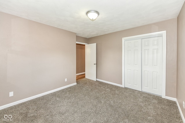 823 Rustic Rd, Anderson, IN 46013 - unfurnished bedroom with carpet and a closet