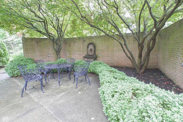 1870 Broadleaf Ct Unit 10, Greenwood, IN 46143 - view of patio / terrace featuring outdoor dining area