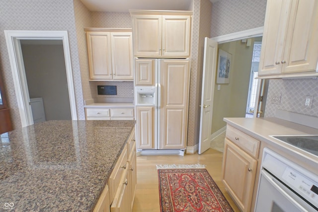 1870 Broadleaf Ct Unit 10, Greenwood, IN 46143 - kitchen with paneled refrigerator, white oven, tasteful backsplash, wallpapered walls, and light wood finished floors