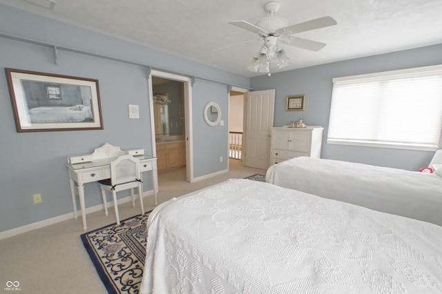 1870 Broadleaf Ct Unit 10, Greenwood, IN 46143 - bedroom with carpet flooring, a ceiling fan, and ensuite bath