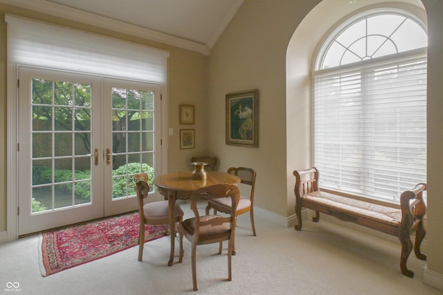 1870 Broadleaf Ct Unit 10, Greenwood, IN 46143 - dining area with lofted ceiling, french doors, crown molding, and carpet flooring