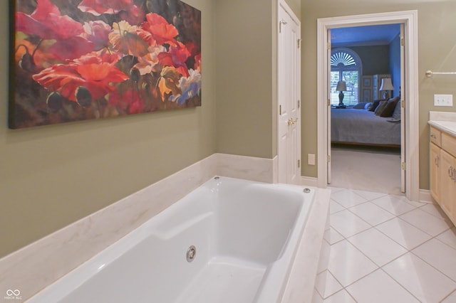 1870 Broadleaf Ct Unit 10, Greenwood, IN 46143 - ensuite bathroom with a whirlpool tub, vanity, and tile patterned floors
