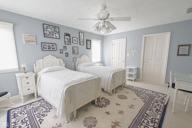 1870 Broadleaf Ct Unit 10, Greenwood, IN 46143 - bedroom featuring a closet, carpet flooring, and a ceiling fan