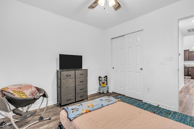 1181 S Aberdeen Dr, Franklin, IN 46131 - bedroom featuring wood finished floors, a closet, and a ceiling fan