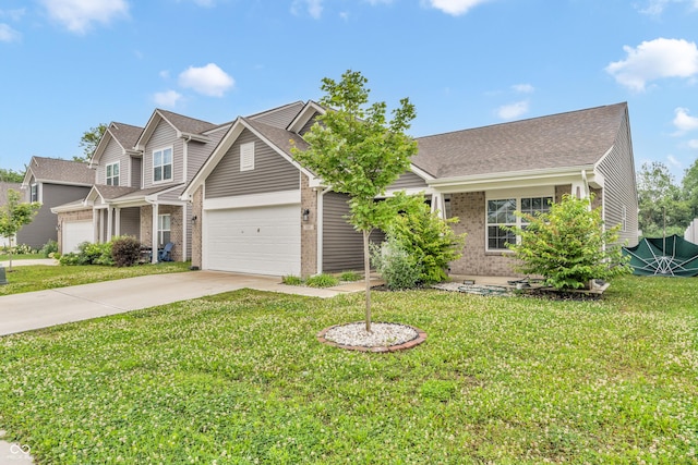 1181 S Aberdeen Dr, Franklin, IN 46131 - view of front of house featuring brick siding, concrete driveway, a front yard, and a shingled roof