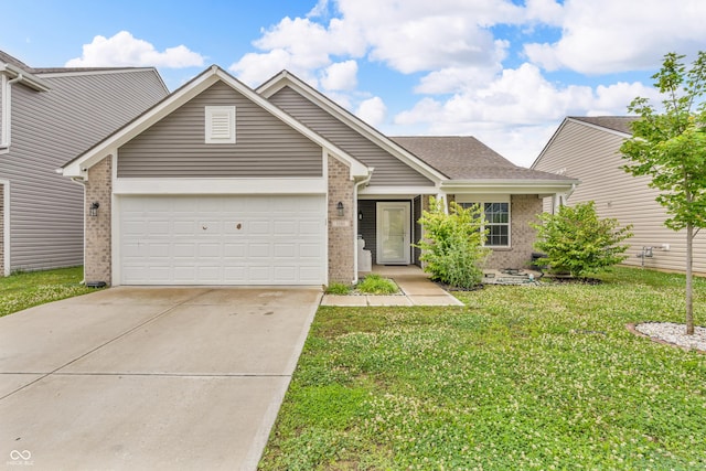 1181 S Aberdeen Dr, Franklin, IN 46131 - view of front of home featuring brick siding, an attached garage, concrete driveway, and a front lawn