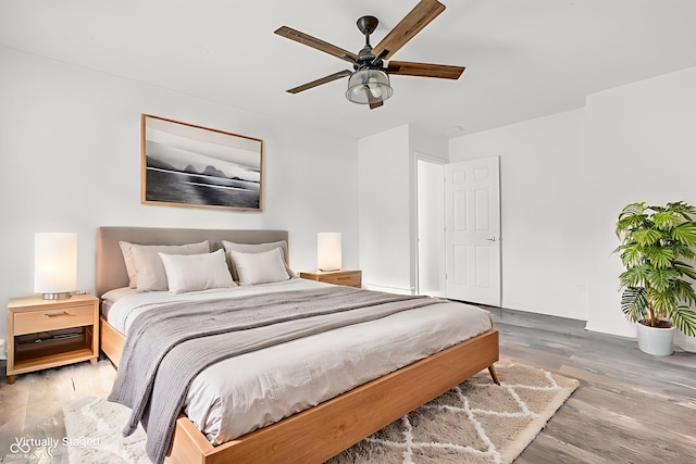 1181 S Aberdeen Dr, Franklin, IN 46131 - bedroom with wood finished floors and ceiling fan
