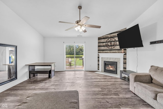 1181 S Aberdeen Dr, Franklin, IN 46131 - living area with a ceiling fan, a tiled fireplace, and wood finished floors