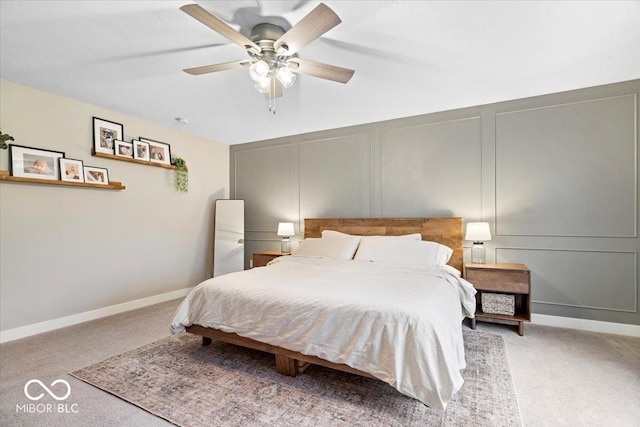 8547 Winton Pl, Pendleton, IN 46064 - bedroom featuring a decorative wall, light colored carpet, and a ceiling fan