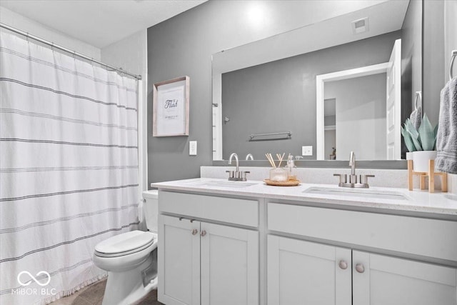 8547 Winton Pl, Pendleton, IN 46064 - full bath with double vanity, curtained shower, and tile patterned flooring