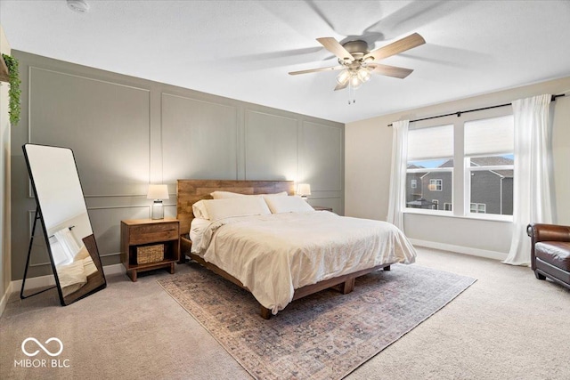 8547 Winton Pl, Pendleton, IN 46064 - bedroom with light colored carpet, a decorative wall, and ceiling fan