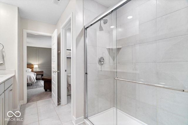 8547 Winton Pl, Pendleton, IN 46064 - full bath featuring connected bathroom, a stall shower, vanity, and tile patterned flooring