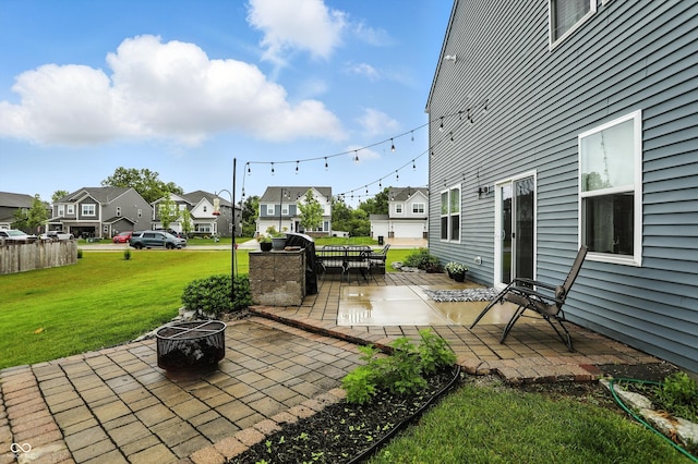 8547 Winton Pl, Pendleton, IN 46064 - view of patio with an outdoor fire pit and a residential view