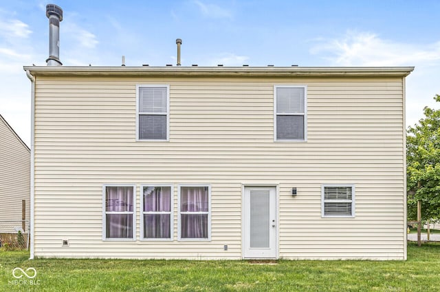 6259 Teacup Dr, Indianapolis, IN 46235 - back of house with a yard
