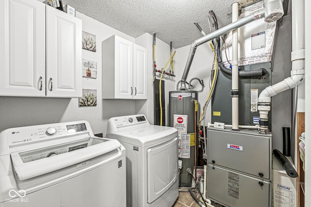 6259 Teacup Dr, Indianapolis, IN 46235 - laundry room with cabinet space, washing machine and dryer, water heater, a textured ceiling, and heating unit